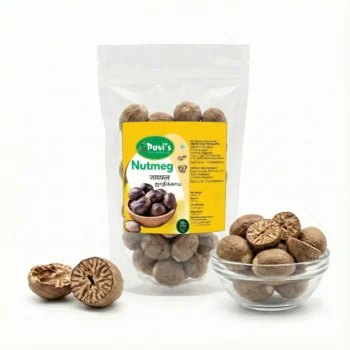 Premium Kerala whole nutmeg seeds on wooden background